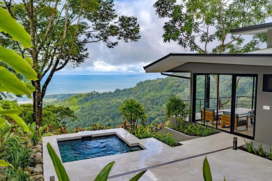 Panoramic view of an eco-friendly lodge nestled in the lush vegetation of Costa Rica